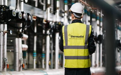 Thermodial engineer views pumps in plantroom