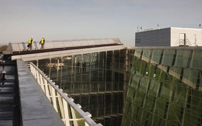 Thermodial engineers on a skywalk between buildings